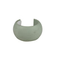 Kreepy Krauly hose weight in sage green, wide curved cuff shape with open back, on white background