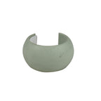 Kreepy Krauly hose weight in sage green, wide curved cuff shape with open back, on white background
