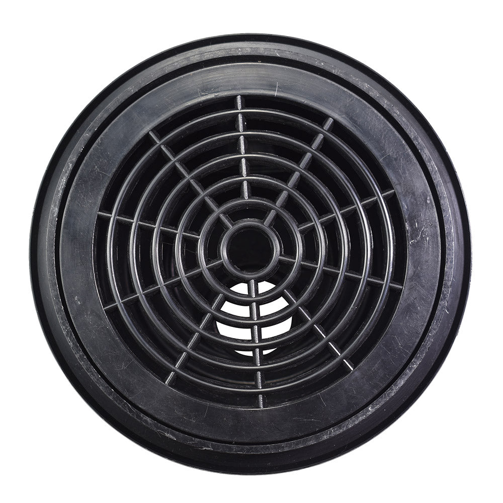 Round black plastic pool bottom drain with concentric ring grid pattern and central hub, recessed design with wide outer flange