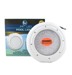 Round white IPP LED colour changing retrofit pool light with 12V AC warning sticker shown beside its retail box