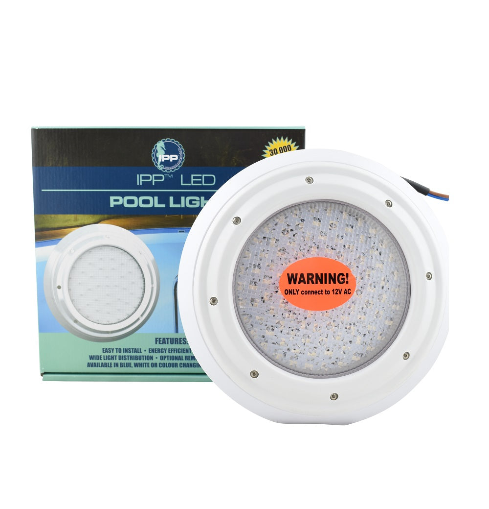 Round white IPP LED colour changing retrofit pool light with 12V AC warning sticker shown beside its retail box
