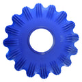 Blue plastic pool cleaner skirt disc with gear-tooth scalloped edge, ribbed surface texture, and central hole, labelled TOP