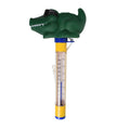 Floating pool thermometer with green crocodile figure wearing sunglasses, yellow tube, dual Fahrenheit and Celsius scale, with tether cord