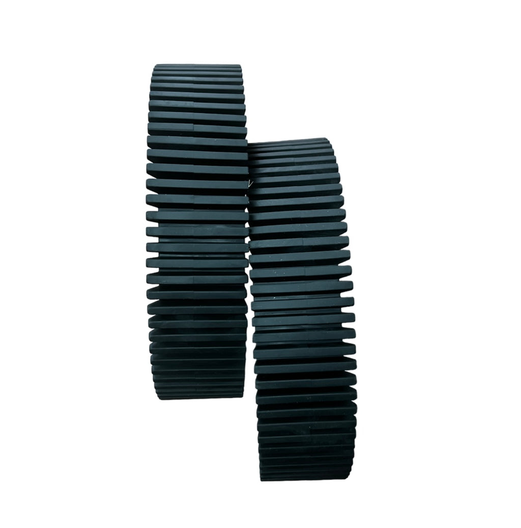 Black ribbed rubber tracks for Kreepy Krauly Hug Bug Pro, shown as a pair on white background