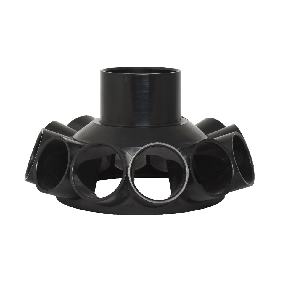 Black plastic multi-port pipe manifold collector body with central top inlet and multiple circular side outlets arranged in a ring