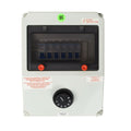 Grey spa distribution board box with six labelled circuit breakers, surge protector label, and rotary temperature control dial