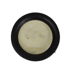 Heating flapper check valve with black rubber outer ring and cream-coloured centre disc viewed from above