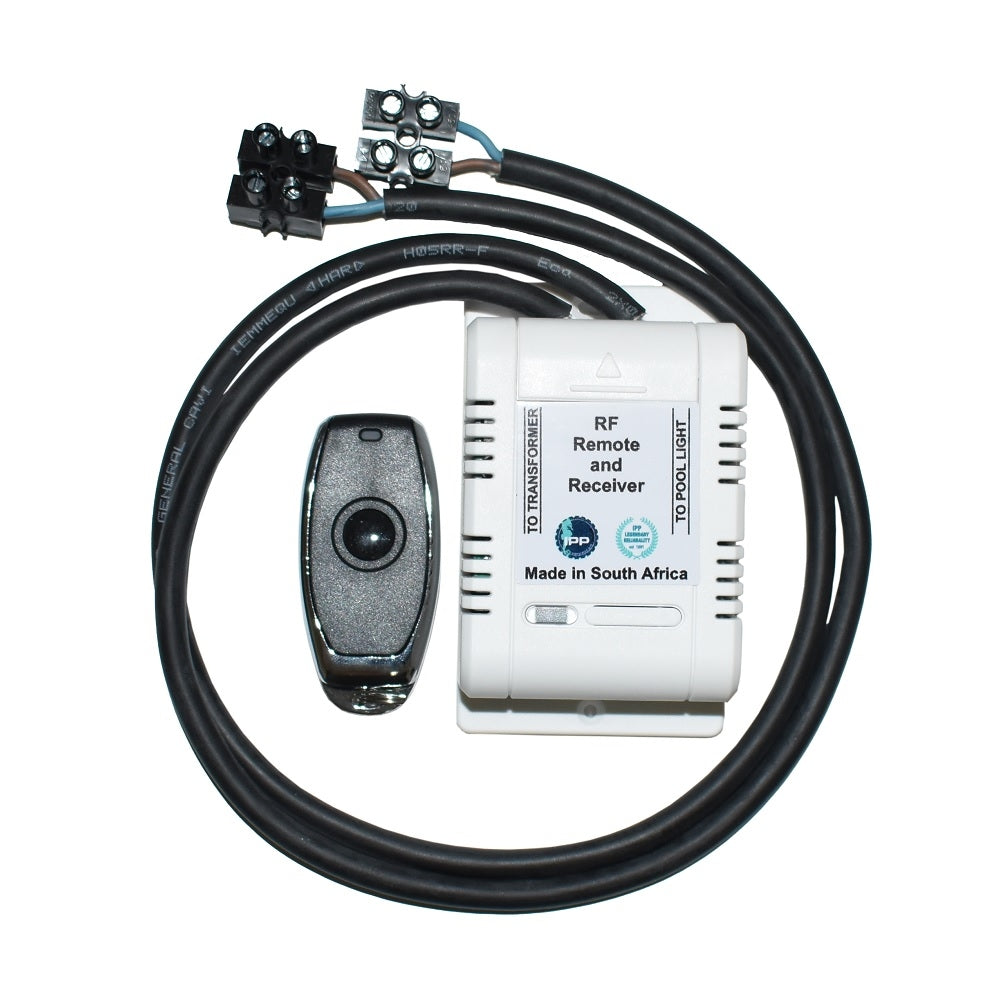 IPP RF remote and receiver kit for pool lights with silver keyfob remote, white control box and black wiring harness