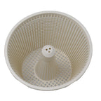 White plastic Speck weir basket with perforated mesh walls, radial ribbing and central stem with drainage holes, viewed from above