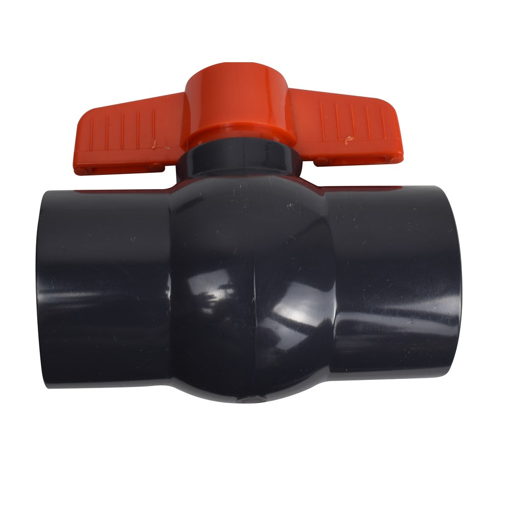PVC ball valve with dark grey body and red T-handle lever, 63mm socket ends, inline two-way shut-off fitting