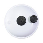 White round spa cartridge filter lid with two black rubber port plugs, viewed from above