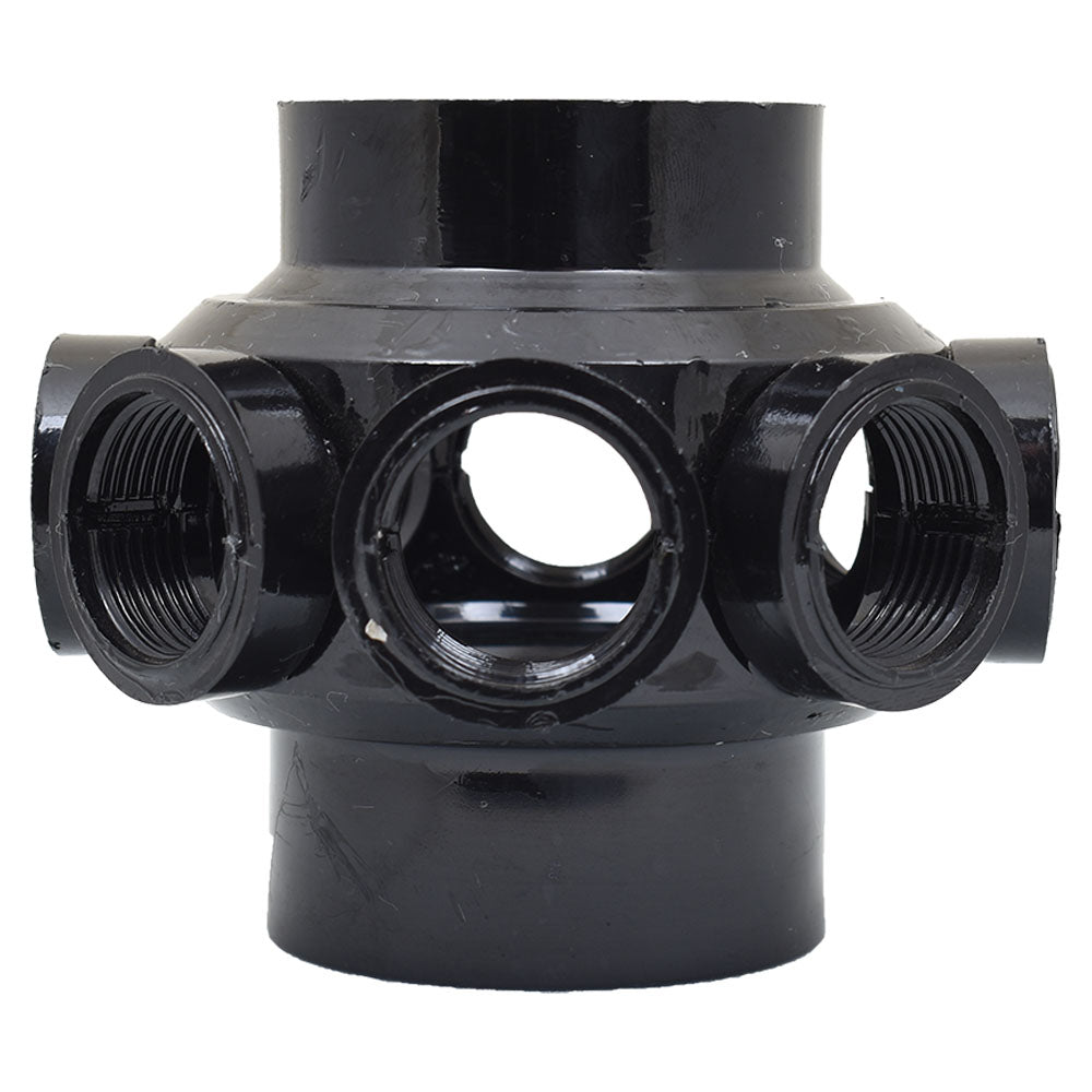 Black plastic multi-port filter manifold body with large top and bottom sockets and four threaded side outlets visible from front