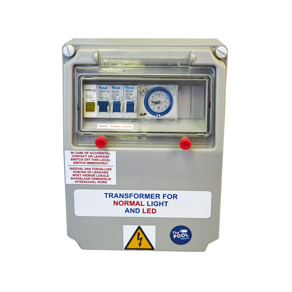Grey plastic pool pump electrical distribution box with circuit breakers, analogue timer, safety labels and hazard warning symbol