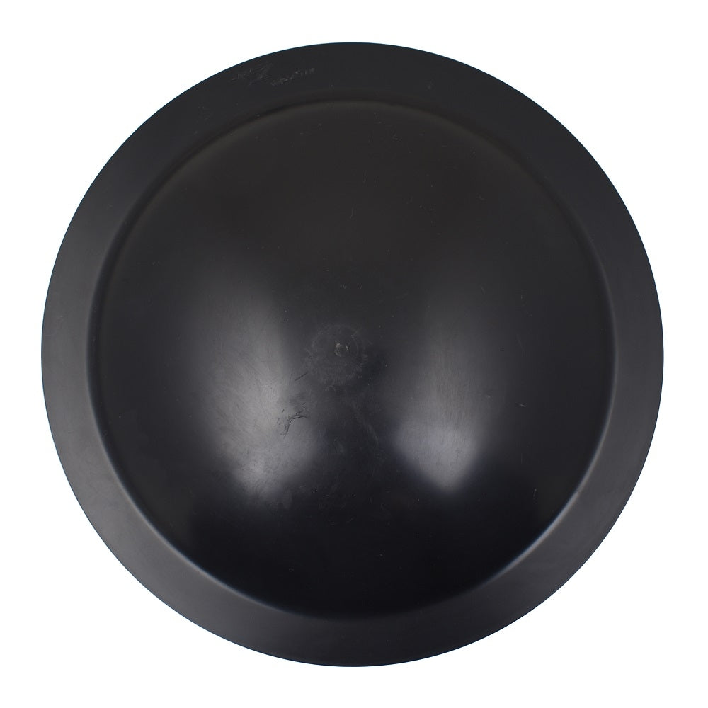 Black plastic bottom drain 110mm with domed centre and flat flanged rim, viewed from above on white background