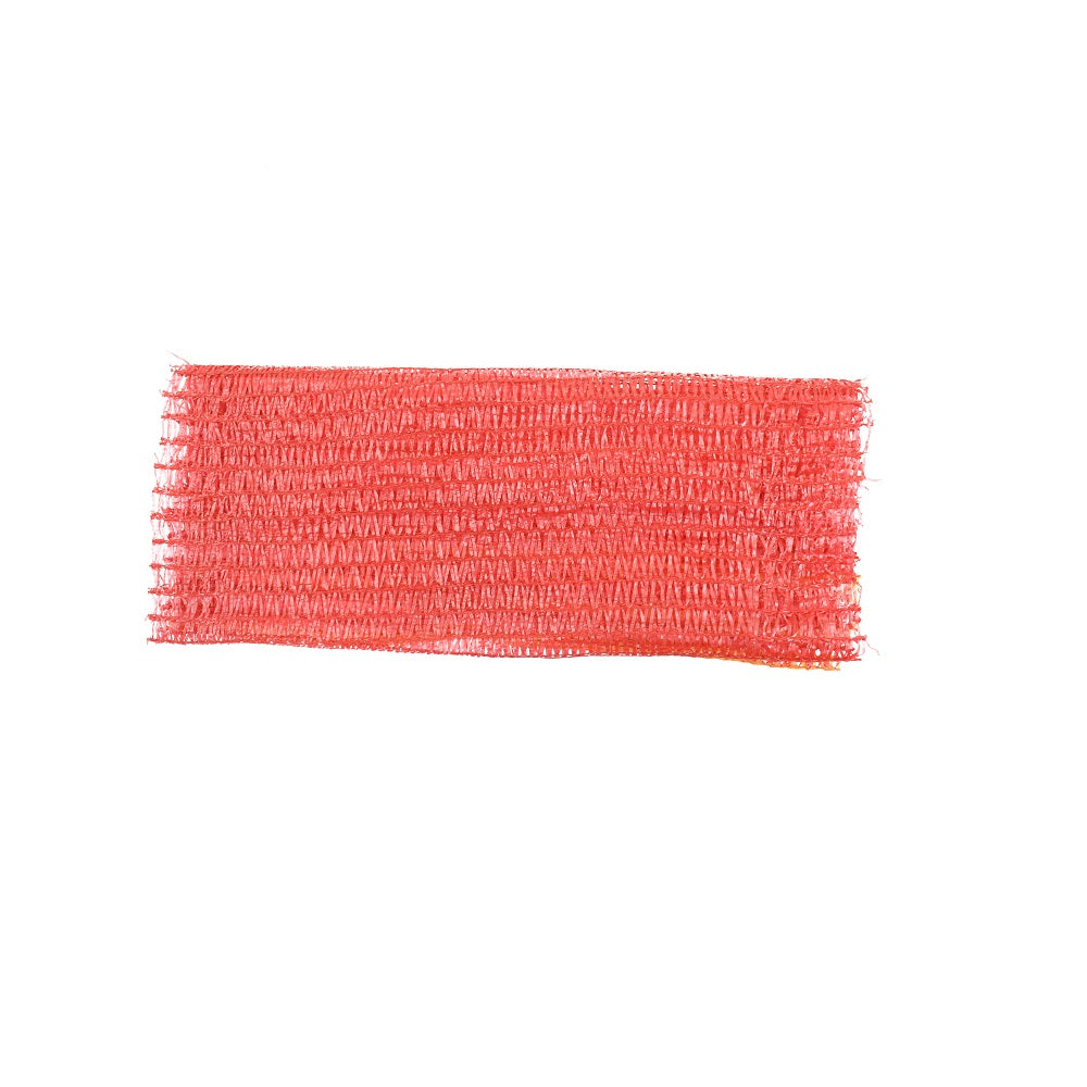 Red mesh produce bag flat lay showing open-weave knitted plastic netting with frayed edges, rectangular shape
